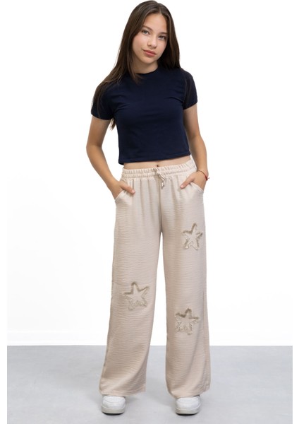 Bej Yıldız Nakışlı Geniş Paça Rahat Kumaş Kız Çocuk Pantolon 21149 fiyatları