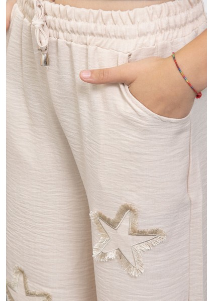 Bej Yıldız Nakışlı Geniş Paça Rahat Kumaş Kız Çocuk Pantolon 21149 modelleri