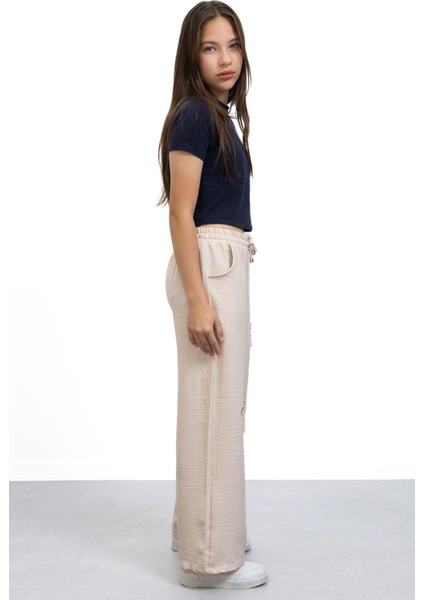 Bej Yıldız Nakışlı Geniş Paça Rahat Kumaş Kız Çocuk Pantolon 21149 fırsatları