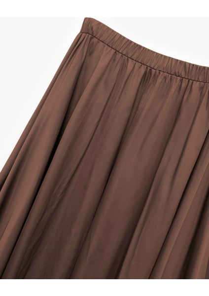 Beli Lastikli Kloş Saten Uzun Etek indirimleri