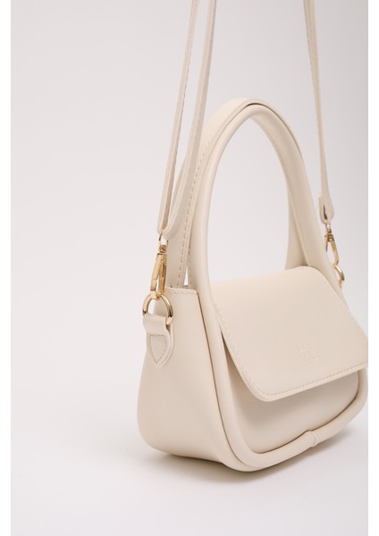 Krem SHK198 Suni Deri ,tek Bölmeli, Çıtçıtlı Ayarlanabilir Askılı El, Kol ve Omuz Çantası indirimleri