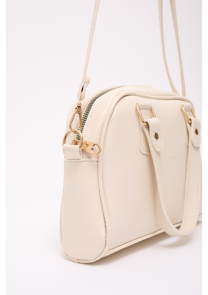 Krem SHK205 Suni Deri Fermuarlı Tek Bölmeli Ayarlanabilir Askılı El,kol ve Omuz Çantası indirimleri