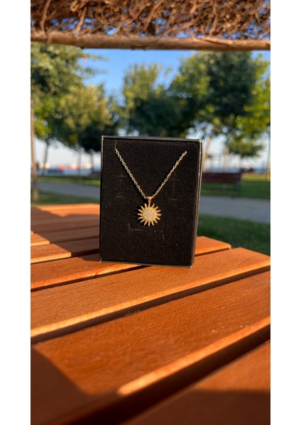 ÇELİK GÜNEŞ DETAYLI GOLD KOLYE