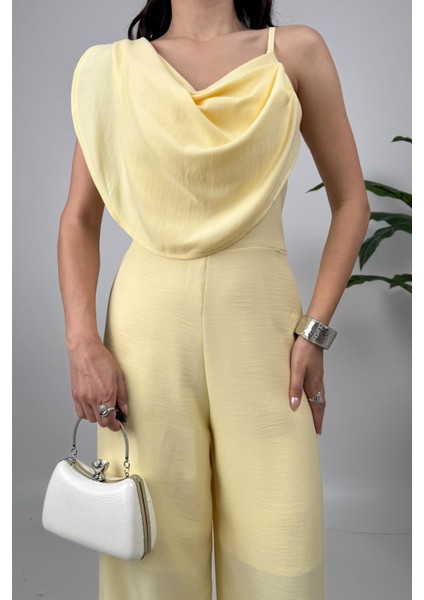 Élan Kadın Drapeli Detaylı Sarı Tulum – Dokulu Kumaş Şıklığı fırsatları