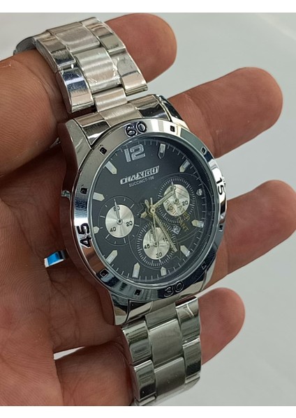 Çelik kordonlu, takvim göstergeli, su geçirmez, 2 yıl garantili Erkek Kol Saati fiyatları