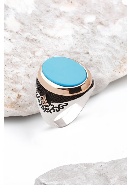 Gümüş Oval Kesim Sıkma Turkuaz Taşlı Yanları Tuğralı Erkek Yüzük