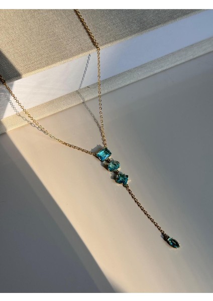 Mavi Baget Taşlı Uzun Y Kolye – Altın Renk Işıltılı ve Zarif Kadın Takı modelleri