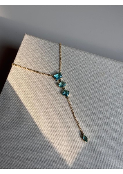 Mavi Baget Taşlı Uzun Y Kolye – Altın Renk Işıltılı ve Zarif Kadın Takı fırsatları