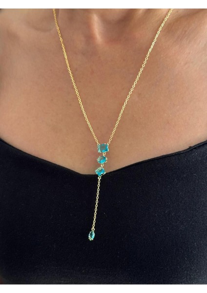 Mavi Baget Taşlı Uzun Y Kolye – Altın Renk Işıltılı ve Zarif Kadın Takı