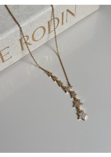 Taş Detaylı Yıldız Figürlü Altın Renk Kadın Çelik Kolye – Işıltılı Zarif Tasarım