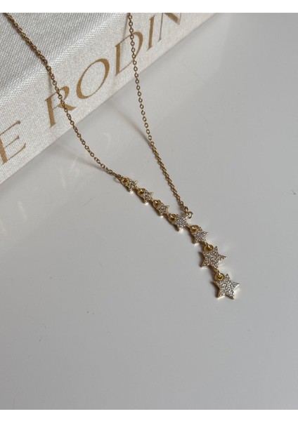 Taş Detaylı Yıldız Figürlü Altın Renk Kadın Çelik Kolye – Işıltılı Zarif Tasarım fiyatları