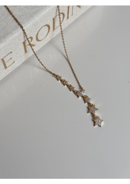 Taş Detaylı Yıldız Figürlü Altın Renk Kadın Çelik Kolye – Işıltılı Zarif Tasarım modelleri