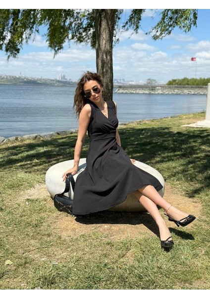 Kadın Ithal Krep Kumaş Kruvaze Yaka Eteği Kloş Kolsuz Mini Elbise fiyatları