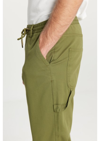 Oversize Bol Kesim Beli Bağlamalı Pamuklu Esnek Armürlü Yan Cepli Pantolon indirimleri