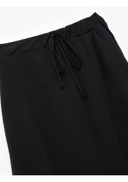 Aerobin Kumaş Midi Boy Çan Kesim Kloş Etek modelleri