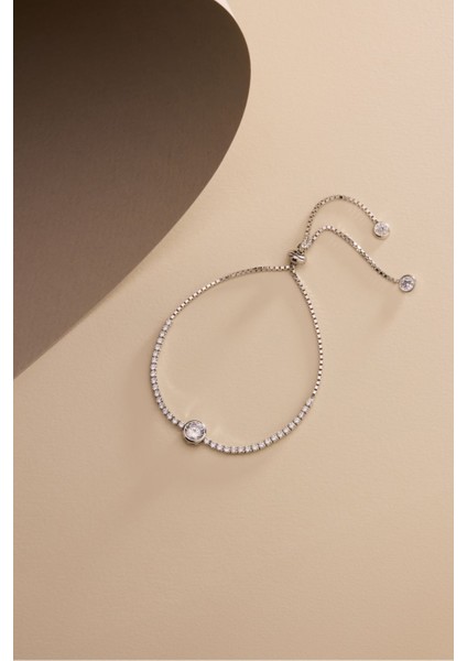 925 Ayar Gümüş Rodyum Kaplama Ayarlanabilir Asansörlü Su Yolu Orta Tektaş Model Bileklik fiyatları