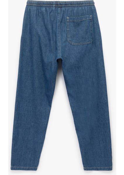 Pamuklu Cep Detaylı Beli Bağcıklı Bol Kalıp Jean Pantolon fiyatları