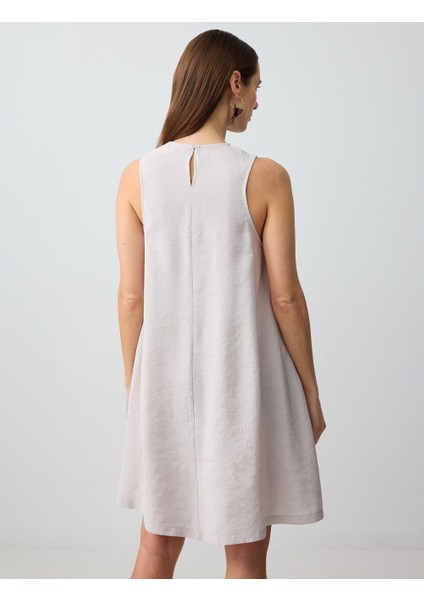 Açık Vizon Rahat Kesim Yuvarlak Yaka Kolsuz Mini Elbise indirimleri