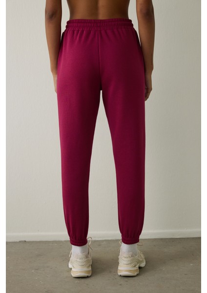 Mor Yüksek Bel Bağlama Detaylı Şardonlu Eşofman Altı modelleri