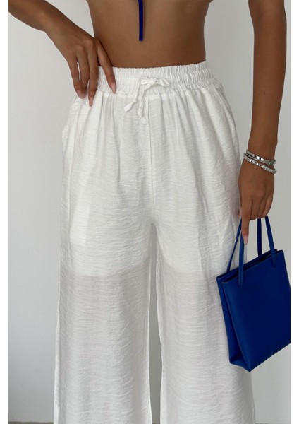 Kadın Beyaz Bol Paça Rahat Pantolon – Yazlık Elastik Bel Astarlı modelleri