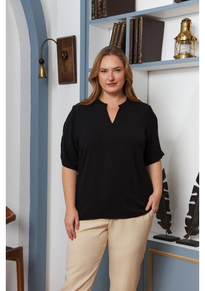 Kol Yırtmaç Detaylı Büyük Beden Siyah Bluz – Modern Dokunuşlarla Şıklığın Yeni Hali