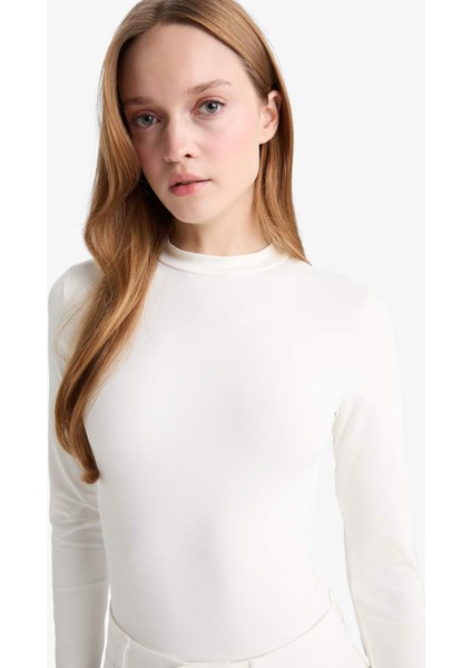 Slim Fit Dar Kesim Yarım Balıkçı Yaka Uzun Kollu Tunik fırsatları