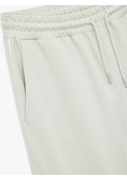 Pamuklu Biyeli Cep Detaylı Beli Bağcıklı Eşofman Altı modelleri
