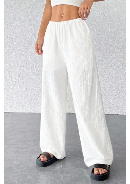 - Kadın Beyaz Bol Kesim Cepli Geniş Paça Dökümlü Pantolon fırsatları