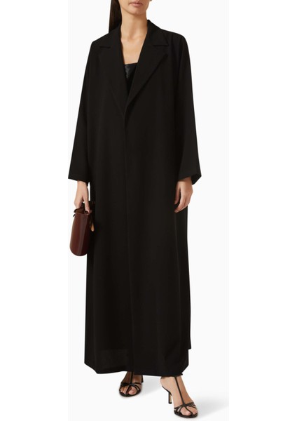 Minimalist A-Line Abaya ile Şıklığı Yakalayın Tekstil Detayları ile Tamamlanan Tasarım fiyatları