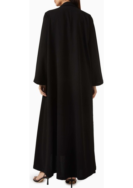 Minimalist A-Line Abaya ile Şıklığı Yakalayın Tekstil Detayları ile Tamamlanan Tasarım modelleri