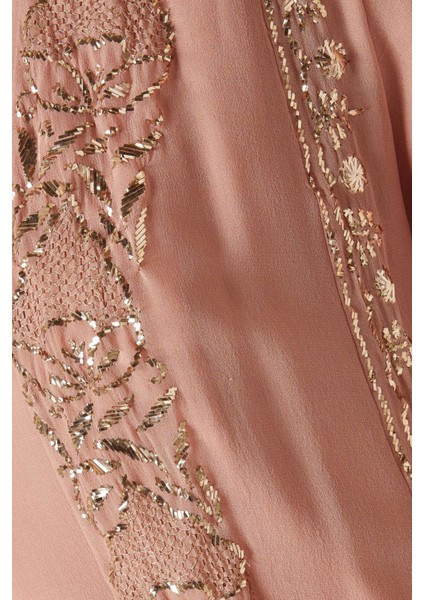 Şıklığı ve Konforu Bir Araya Getiren Payetli Abaya ile Hem Rahat Hem Stil Sahibi Olun indirimleri