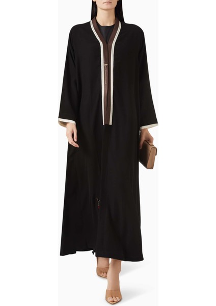Modern ve Şık Uzun Kollu Abaya Bütünleyici Detaylarla Zarif Görünüm Sunuyor fiyatları