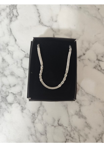 Şıklığı ve Dayanıklılığı Bir Arada Sunan Erkek Çelik Kolye