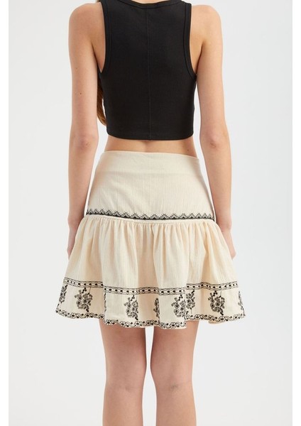 Kadın İşlemeli Yüksek Bel Volanlı Mini Etek Krem Doğal fırsatları