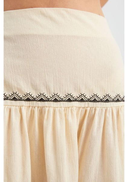Kadın İşlemeli Yüksek Bel Volanlı Mini Etek Krem Doğal indirimleri