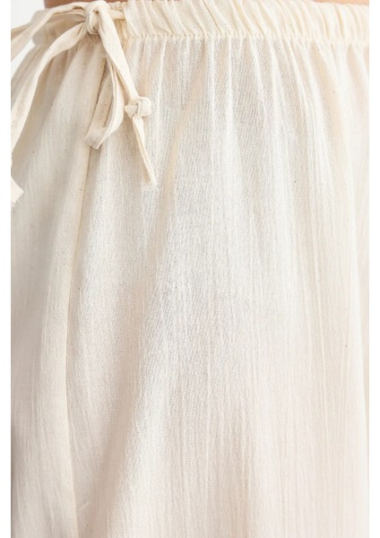 Kadın Yaylı ve Yandan Bağlamalı Bol Bacaklı Pantolon Natural indirimleri