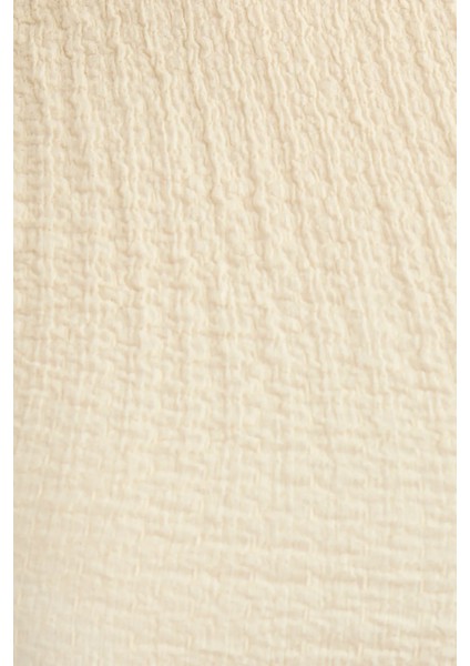 Kadın Dokuma Kumaşlı Yuvarlak Yaka Kısa Kollu Kırpılmış Üst Natural indirimleri