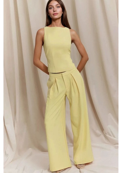 Kadın Kolsuz Vücuda Oturan Bluz Sarı fiyatları