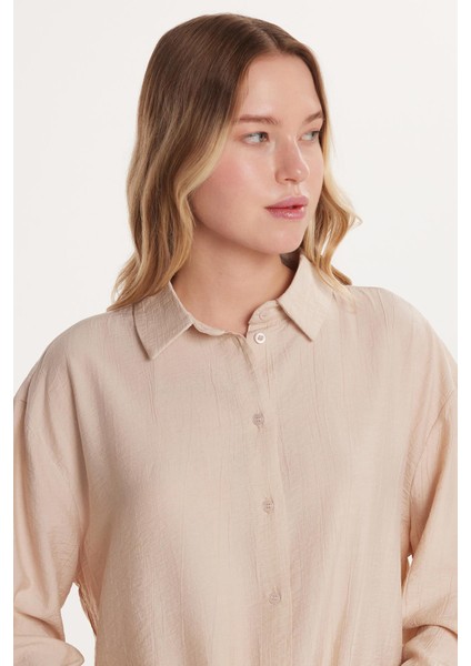 Kadın Regular Fit Uzun Kollu Sırt Bağlama Detaylı Taş Gömlek fiyatları