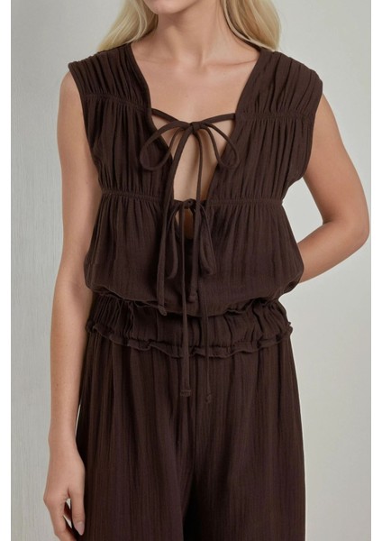 Kadın Yuvarlak Yakalı Dokulu Geniş Paça Tulum Brown fiyatları