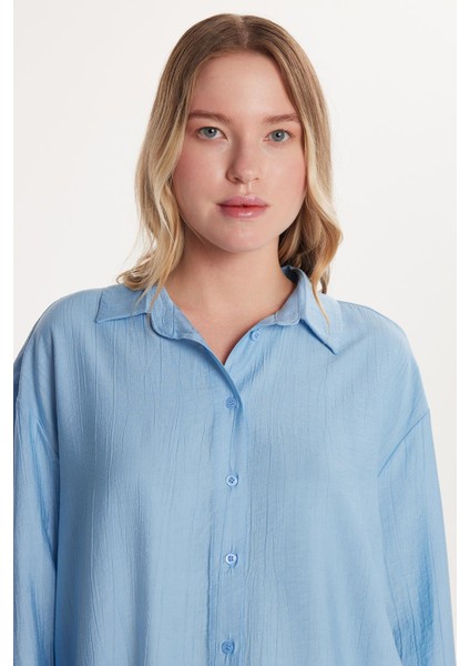 Kadın Regular Fit Uzun Kollu Sırt Bağlama Detaylı Mavi Gömlek fiyatları