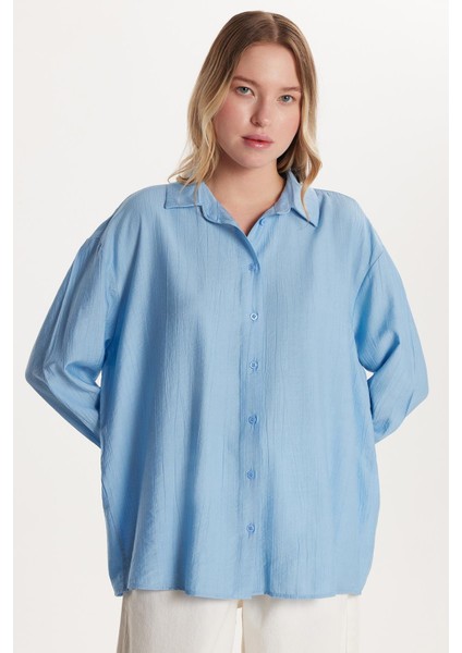 Kadın Regular Fit Uzun Kollu Sırt Bağlama Detaylı Mavi Gömlek fırsatları