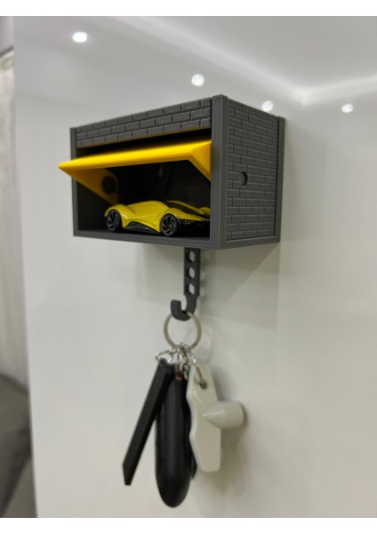 Garaj Tasarımlı Açılabilir Hareketli Kapaklı Anahtarlık (Oyuncak Araba Dahil Değil) fırsatları