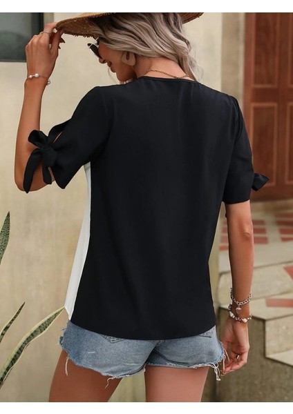 Kadın Kısa Kollu Kollardan Bağlamalı Önden Asimetrik Kesim Çift Renk Detaylı Düğmeli Ithal Krep Bluz fiyatları