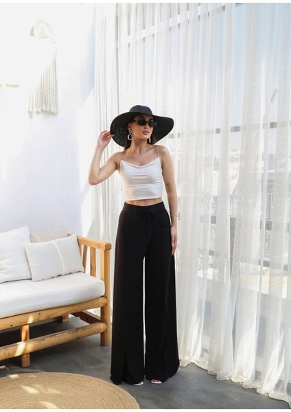 Keten Önü Çapraz Parçali Lasti̇kli̇ ve Bağcikli Geni̇ş Paça Pantolon