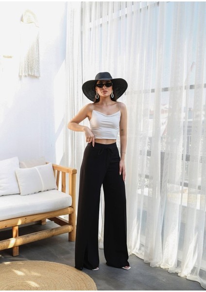 Keten Önü Çapraz Parçali Lasti̇kli̇ ve Bağcikli Geni̇ş Paça Pantolon fırsatları