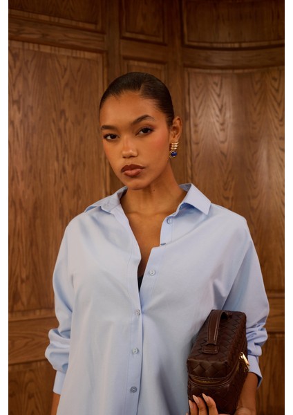 Düğmeli Mavi Gömlek fırsatları