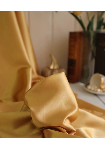 Asetat Saten Dökümlü Kumaş Gold Renktedir