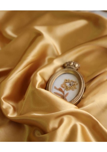 Asetat Saten Dökümlü Kumaş Gold Renktedir fiyatları