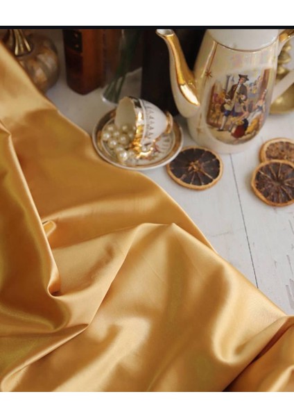 Asetat Saten Dökümlü Kumaş Gold Renktedir fırsatları
